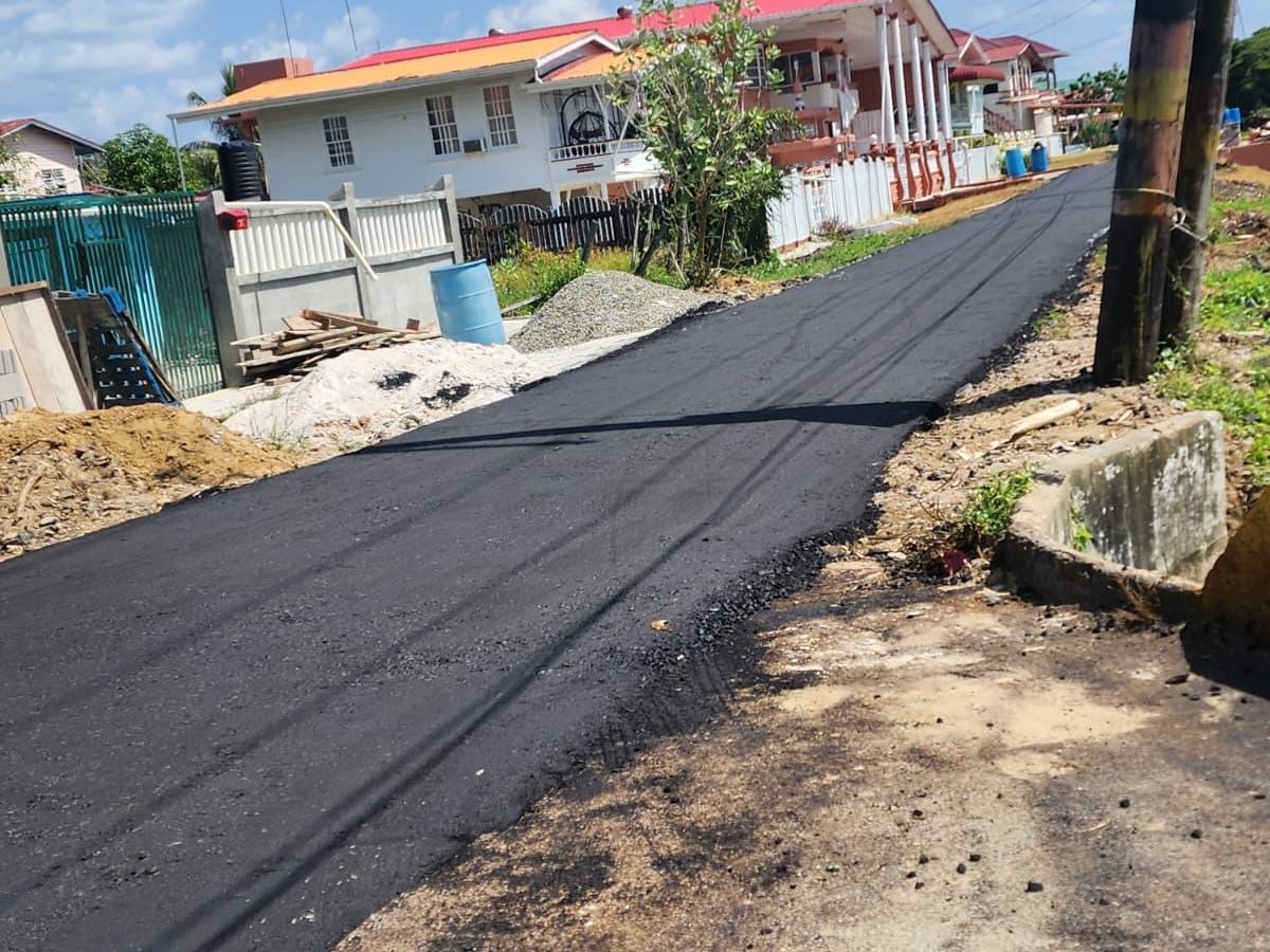 Road surfacing and asphalt paving